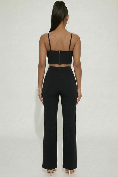 Bustier crop top y pantalones de pierna ancha con abertura frontal